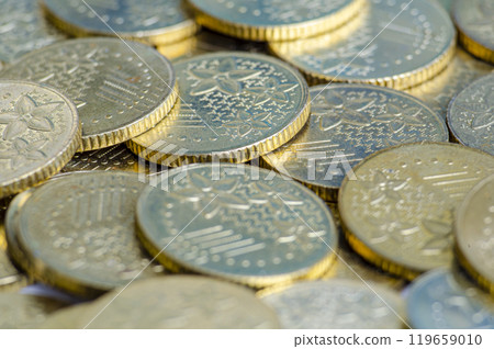 Close up view of golden coins representing business, investment or any monetary concept 119659010