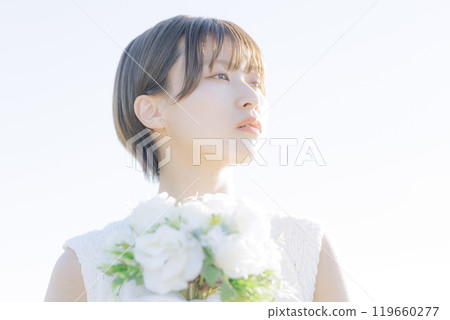 A woman holding a bouquet A woman holding a bouquet 119660277