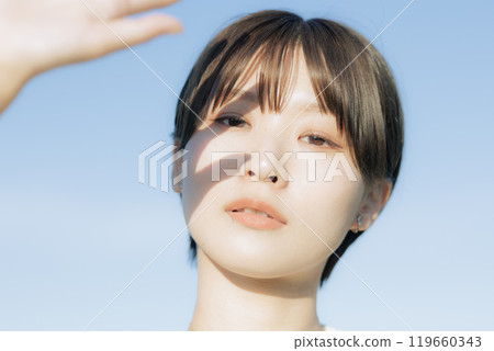 A young woman staring 119660343