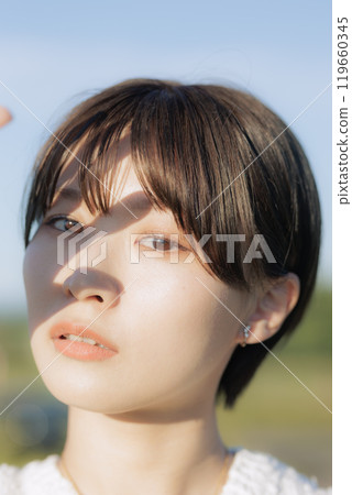 A young woman staring 119660345