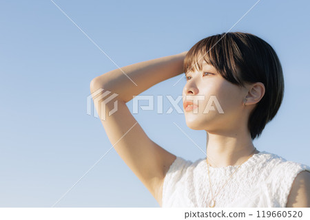 A young woman looking far away A young woman looking far away 119660520