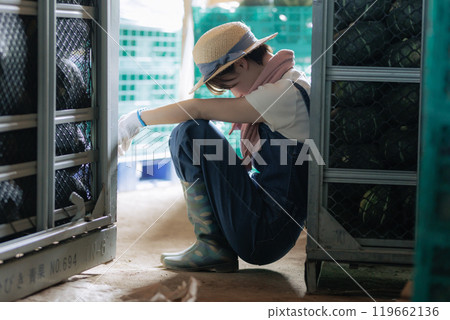 Young farmer woman taking a break 119662136