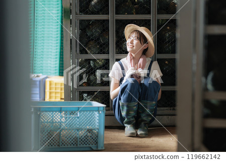 Young farmer woman taking a break 119662142