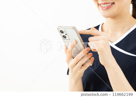 Beauty staff operating a smartphone 06 Beauty staff operating a smartphone 06 119662199