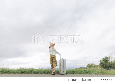Young woman traveling 119663572