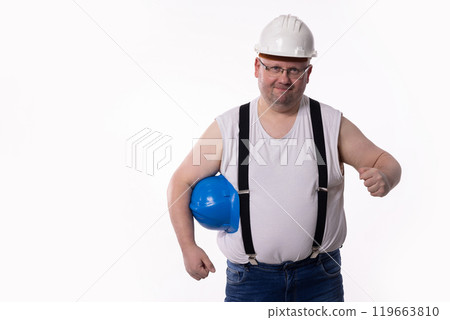 A Construction Worker Confidently Posing in a Hard Hat Along with Essential Safety Gear A Construction Worker Confidently Posing in a Hard Hat Along with Essential Safety Gear 119663810