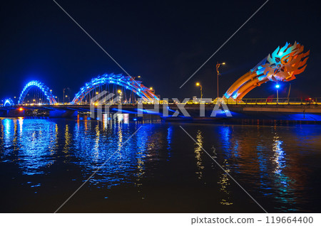 Dragon Bridge over Han River is famous landmark in city of Da Nang in Vietnam at night 119664400