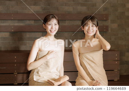 Young women in the sauna Young women in the sauna 119664689