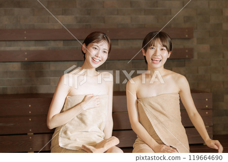 Young women in the sauna 119664690