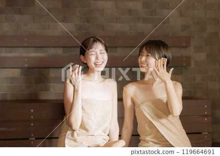 Young women in the sauna 119664691