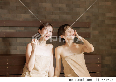 Young women in the sauna Young women in the sauna 119664692