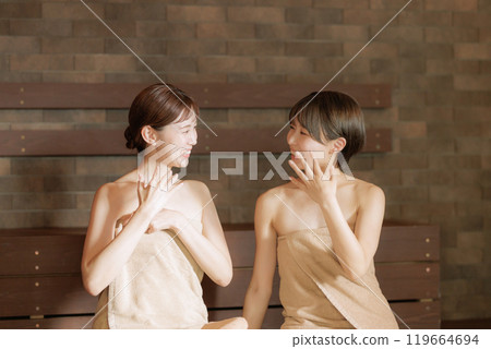 Young women in the sauna Young women in the sauna 119664694