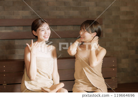 Young women in the sauna Young women in the sauna 119664696