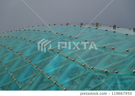 Bridge of Peace, steel and glass construction pedestrian bridge over Kura Mtkvari river in central Tbilisi, Georgia 119667950