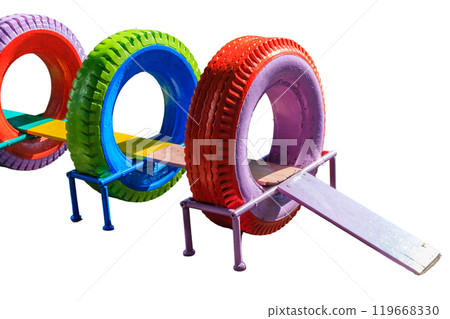 children's playground with a variety of play structures. The playground is surrounded by grass and trees children's playground with a variety of play structures. The playground is surrounded by grass and trees 119668330