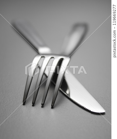 Fork and knife on table Fork and knife on table 119669277