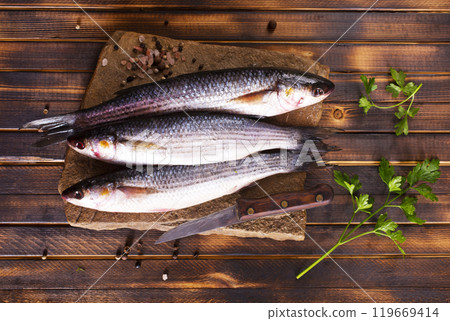 Gray Mullet Fish (Kefal) on stone board Gray Mullet Fish (Kefal) on stone board 119669414