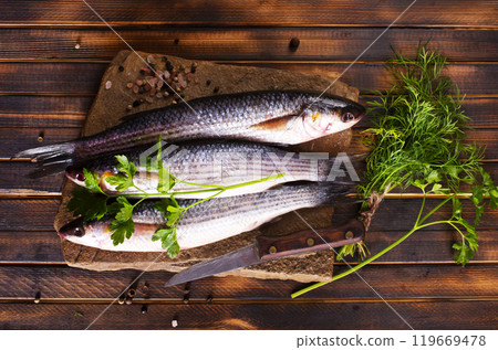 Gray Mullet Fish (Kefal) on stone board Gray Mullet Fish (Kefal) on stone board 119669478