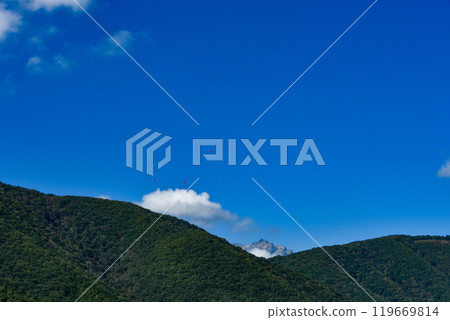 Autumn foliage and the impressive Northern Alps 119669814