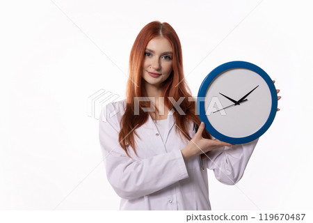 A Woman Holding a Clock Against a Crisp White Background, Highlighting Various Concepts 119670487