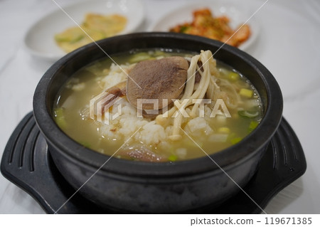 traditional Korean soup made by boiling beef head meat, ox bones, burdock, taro stems, and radish for a long time traditional Korean soup made by boiling beef head meat, ox bones, burdock, taro stems, and radish for a long time 119671385