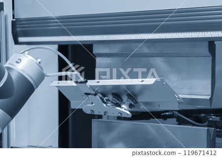 High technology bending machine  operation with robotic system in the light blue scene. 119671412