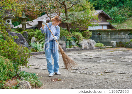 Woman sweeping the garden Countryside Old house Inn Life Woman sweeping the garden Countryside Old house Inn Life 119672963
