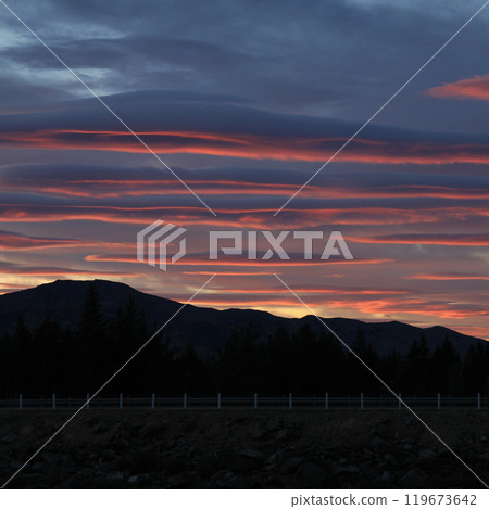 Colorful clouds in Hawea, New Zealand. 119673642