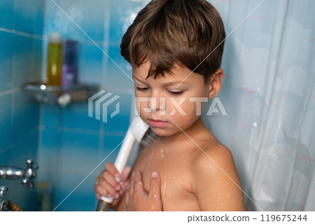 6 year old child taking a shower 6 year old child taking a shower 119675244