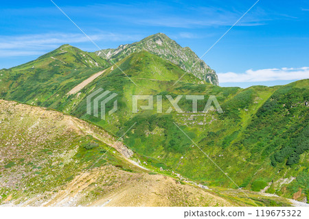 Mount Okudainichi seen from the descent to Raichozawa Campsite. Climbing Mount Tsurugi in the Northern Alps 119675322
