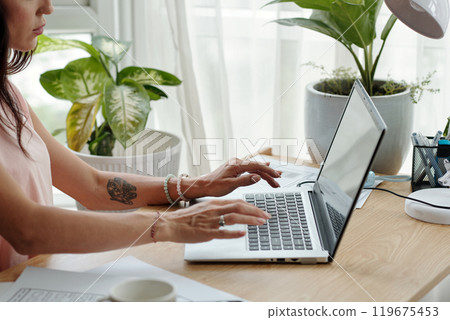 Updating Work Documents on Laptop in Home Office 119675453