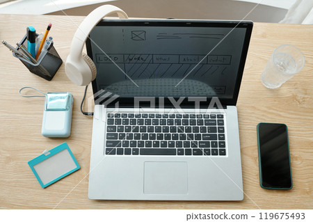 Modern Workstation Featuring Laptop and Accessories 119675493