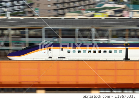 Yamagata Shinkansen E8 Series Tsubasa train traveling on the Tohoku Shinkansen (panning shot) Yamagata Shinkansen E8 Series Tsubasa train traveling on the Tohoku Shinkansen (panning shot) 119676335