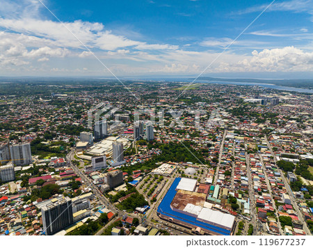 Aerial view of Downtown of Davao City. Traffic highway transportation. Modern buildings and Malls. Mindanao, Philippines. Aerial view of Downtown of Davao City. Traffic highway transportation. Modern buildings and Malls. Mindanao, Philippines. 119677237