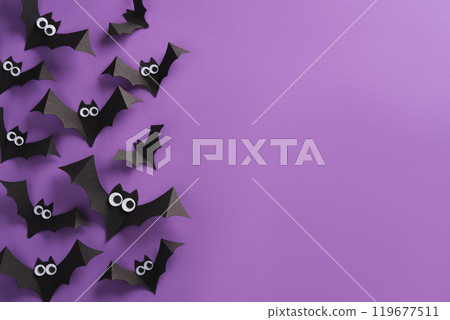 Cute paper bats on purple background, Halloween horizontal banner, place for your text 119677511