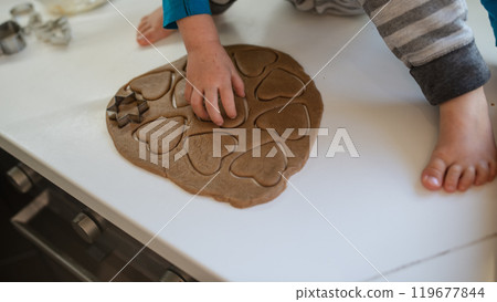 Toddler child making cookies 119677844