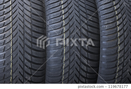 Identical Tread Pattern Design Of Non Studded Winter Tyres. New Car Tyres Texture Stock Photo For Background 119678177
