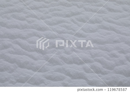 Winter snow texture with rippled and soft patterns in nature Winter snow texture with rippled and soft patterns in nature 119678587