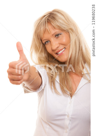 Mature woman giving thumbs up sign isolated 119680238