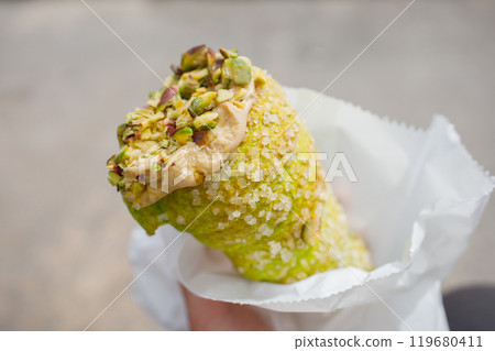 Maltese pistachio cannoli close up Maltese pistachio cannoli close up 119680411