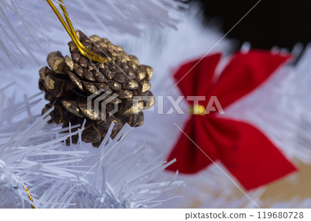 Closeup of elegant christmas wreath decorated pine cones and fir trees. Christmas mood. Closeup of elegant christmas wreath decorated pine cones and fir trees. Christmas mood. 119680728