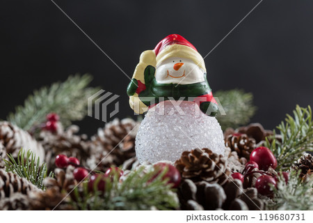 Closeup of elegant christmas wreath decorated pine cones and fir trees. Christmas mood. 119680731
