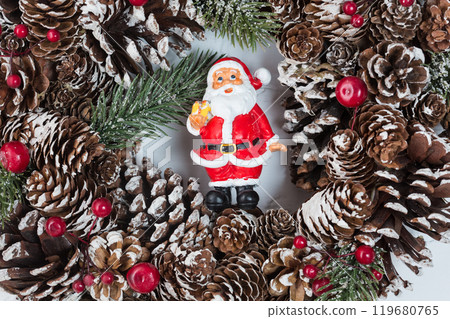Elegant christmas wreath decorated pine cones and fir trees. Christmas mood. Elegant christmas wreath decorated pine cones and fir trees. Christmas mood. 119680765