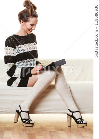 Fashion trendy woman with tablet at home 119680930
