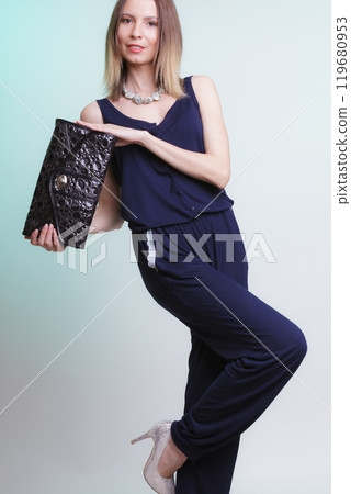 Elegant fashion woman with leather handbag Elegant fashion woman with leather handbag 119680953
