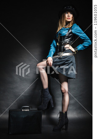 beautiful steampunk woman with bag on black. beautiful steampunk woman with bag on black. 119681055