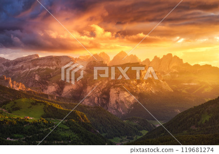 Mountains at beautiful golden sunset in summer. Colorful landscape 119681274