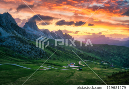 Road in mountains, golden sunlight and colorful sky at sunset Road in mountains, golden sunlight and colorful sky at sunset 119681279