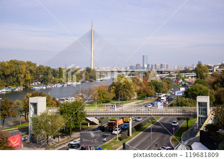Boat Ada Ciganlija with Ada Bridge, a cable-stayed bridge over the Sava river in Belgrade, Serbia Boat Ada Ciganlija with Ada Bridge, a cable-stayed bridge over the Sava river in Belgrade, Serbia 119681809