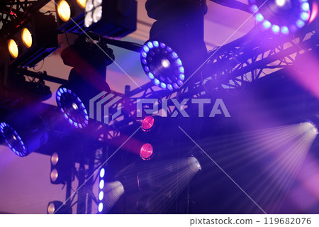 various concert lighting equipment over the stage 119682076